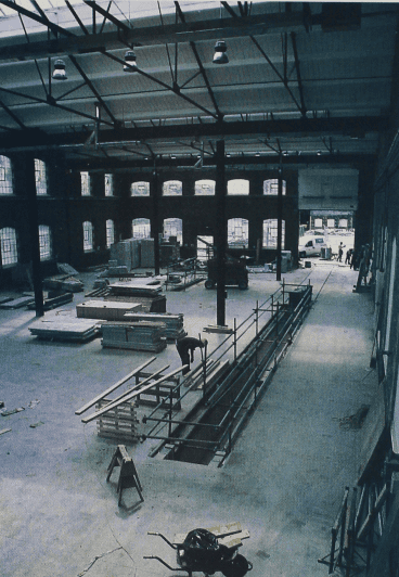 One of the attractions will be a view of work being carried out on actual locomotives, mostly for preserved railways. The restoration facilities are currently in the old 19 Shop, just out of sight through the far doors, but will be transferred into this annexe. Viewed from the new public gallery, preparations are proceeding apace, including an engine pit.