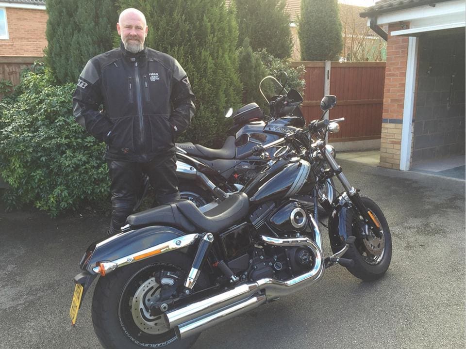 Motorcycle instructor criticises Shell. Told to remove helmet as woman in burka fills up next to him.