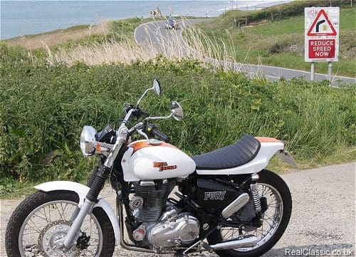 Reduce speed now; there might be gravel...