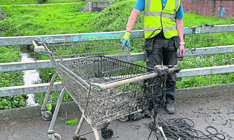 50 trollies in local waterway – no longer!
