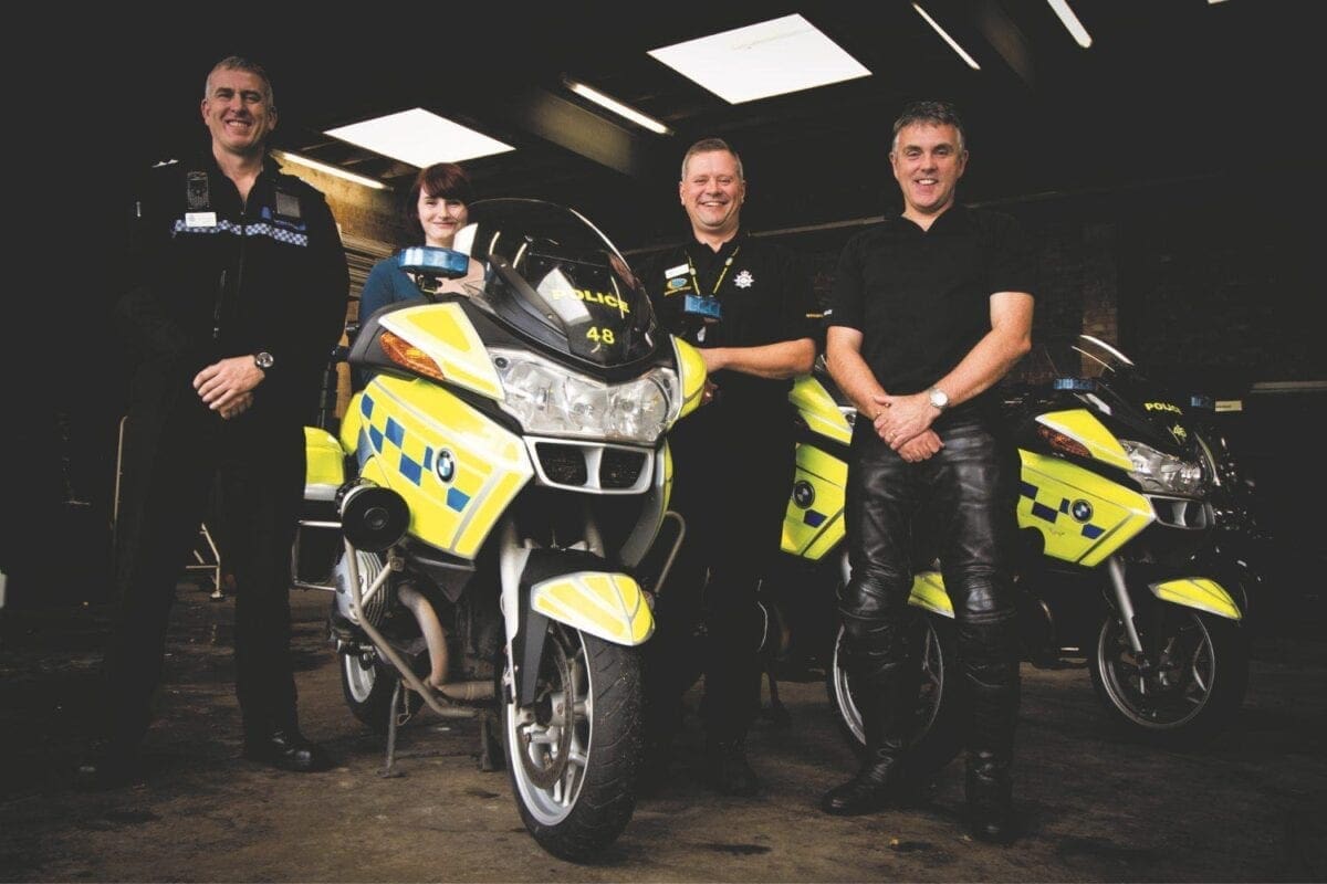 Motor Cycle Monthly's Carli Ann Smith with (from left) Inspector Mark Rogers; PC Simon Burgin and Sergeant Chris Clare