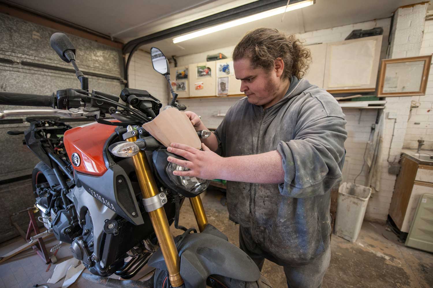 A clay-built deflector is tested on the bike
